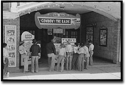Children waiting outside of a Texas movie theater in 1903.