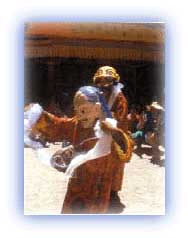 Masked dancer in the monastery. Credit: Discover India magazine