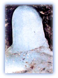 The holy ice lingam at Amarnath. Formed naturally of an ice-stalagmite, it waxes and wanes with the moon. It is the phallic symbol of Lord Shiva. Credit: KOA