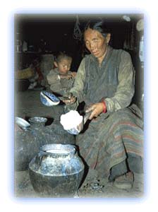 Making yak butter. Credit: Matjaz Vrecko