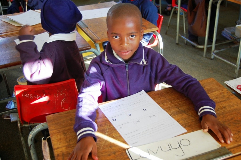 Luvuyo-writing-upside-down